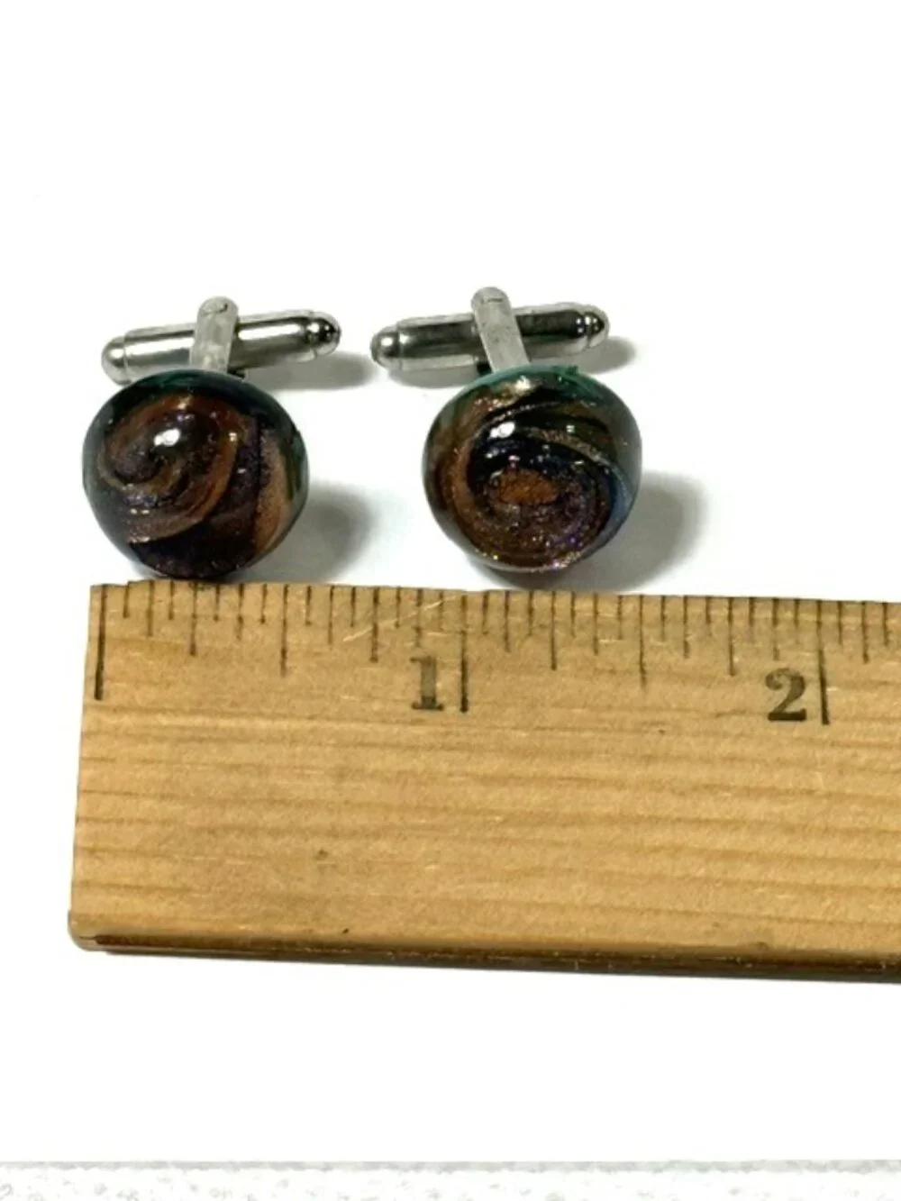 Dichroic glass men's cuff links.